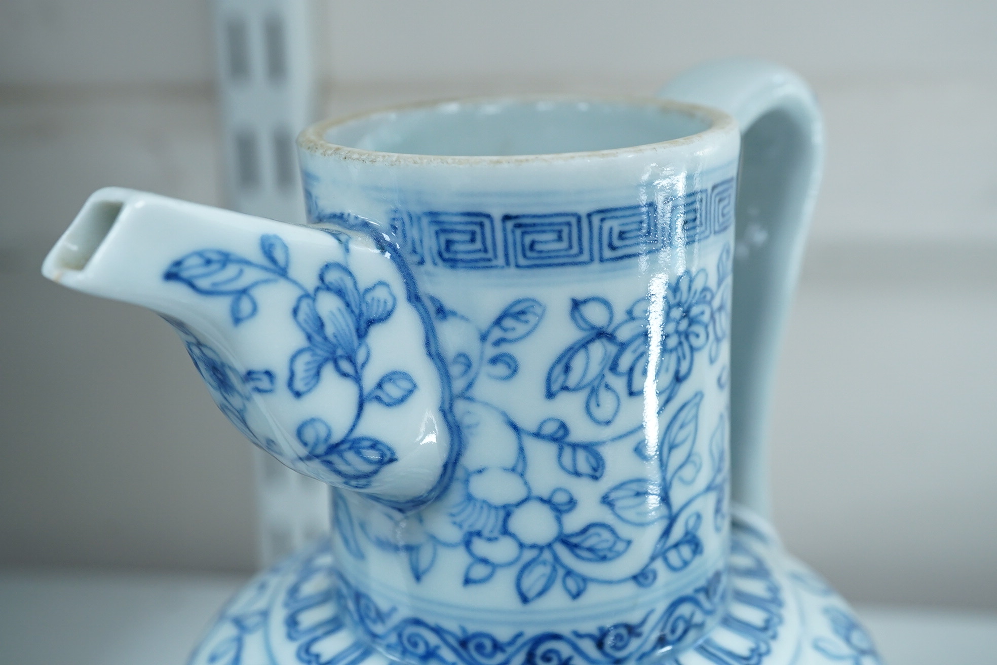 A Chinese blue and white ewer, Hongzhi mark, probably Qing dynasty